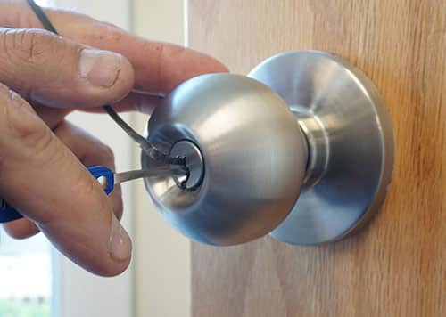 image of a lock being picked by a certified professional locksmith